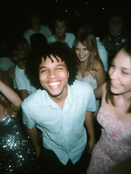 A group of people smiling together